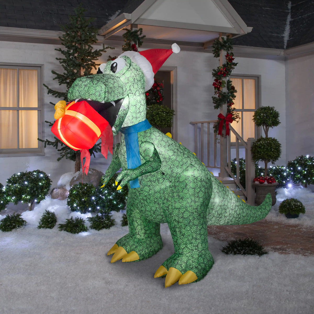 9.5 ft. Inflatable Tyrannosaurus Rex with Gift and LED Lights, Plug-In