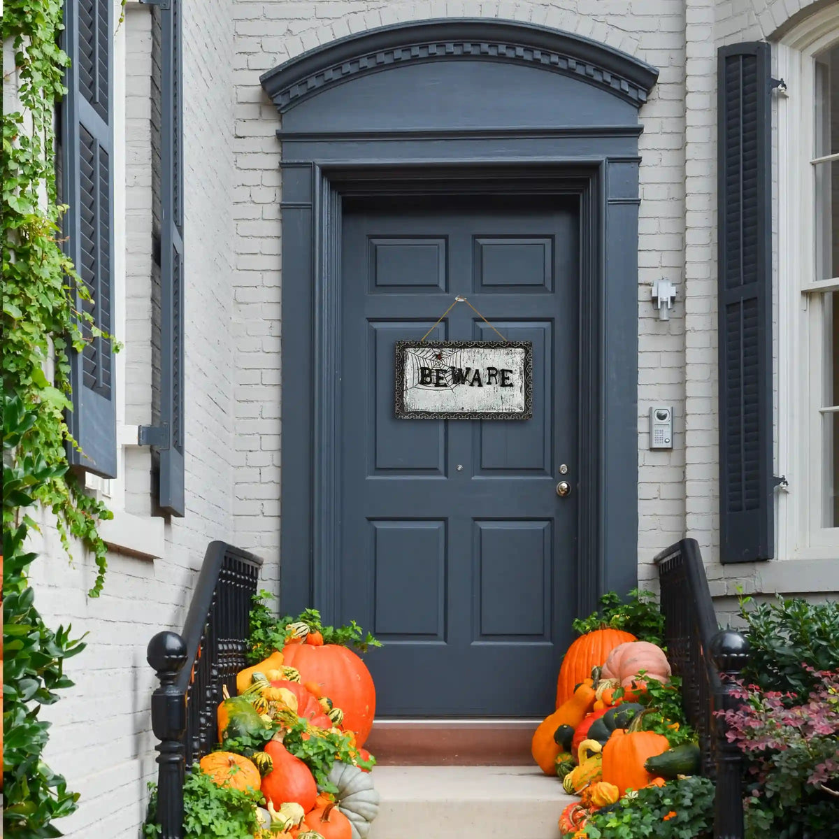 18 in. Halloween Pre-Lit Sound Activated Animated Hanging Door Sign with LED Lights