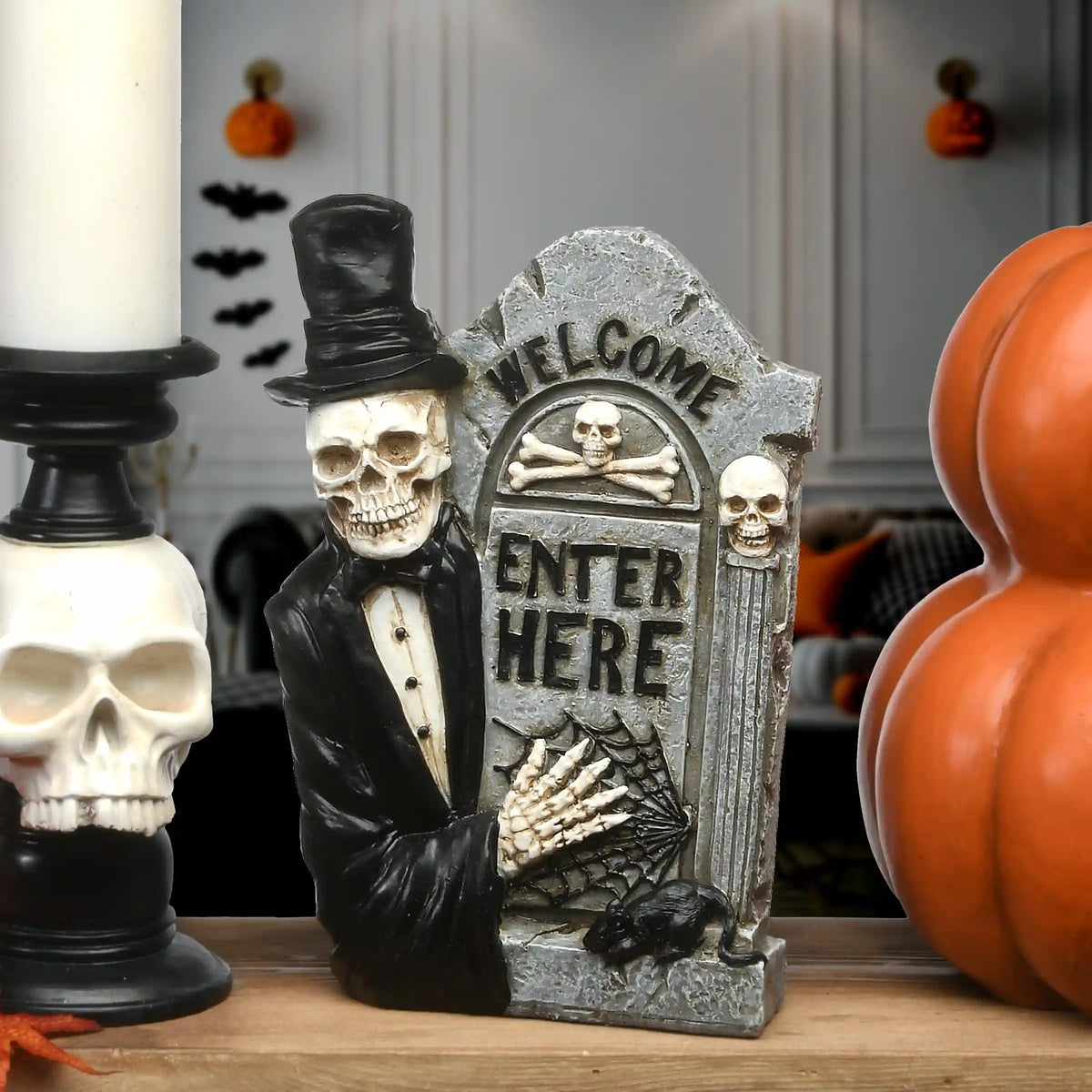12 in. Halloween Skeleton Holding a Tombstone Decoration