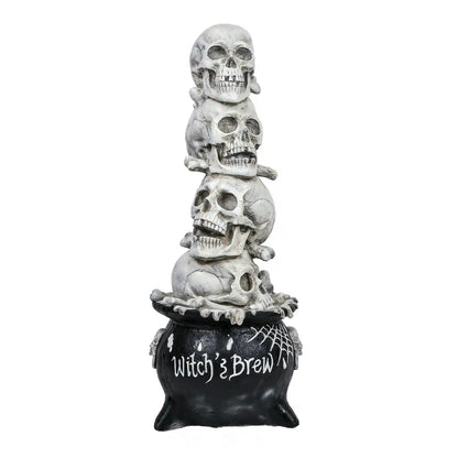 38 in. Halloween Stacked Skulls in a Cauldron Tabletop Decoration