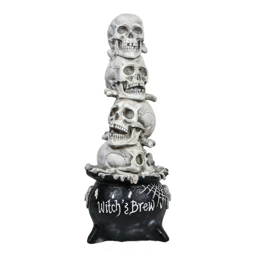 38 in. Halloween Stacked Skulls in a Cauldron Tabletop Decoration