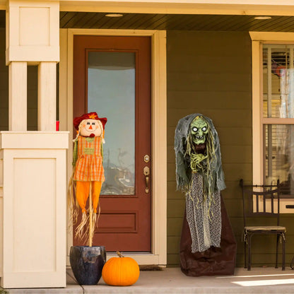 59 in. Halloween Pre-Lit Sound Activated Animated Scary Green Witch with LED Lights