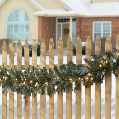 9 ft. Pre-Lit Frosted Arctic Spruce Garland with Clear Lights, Plug-In