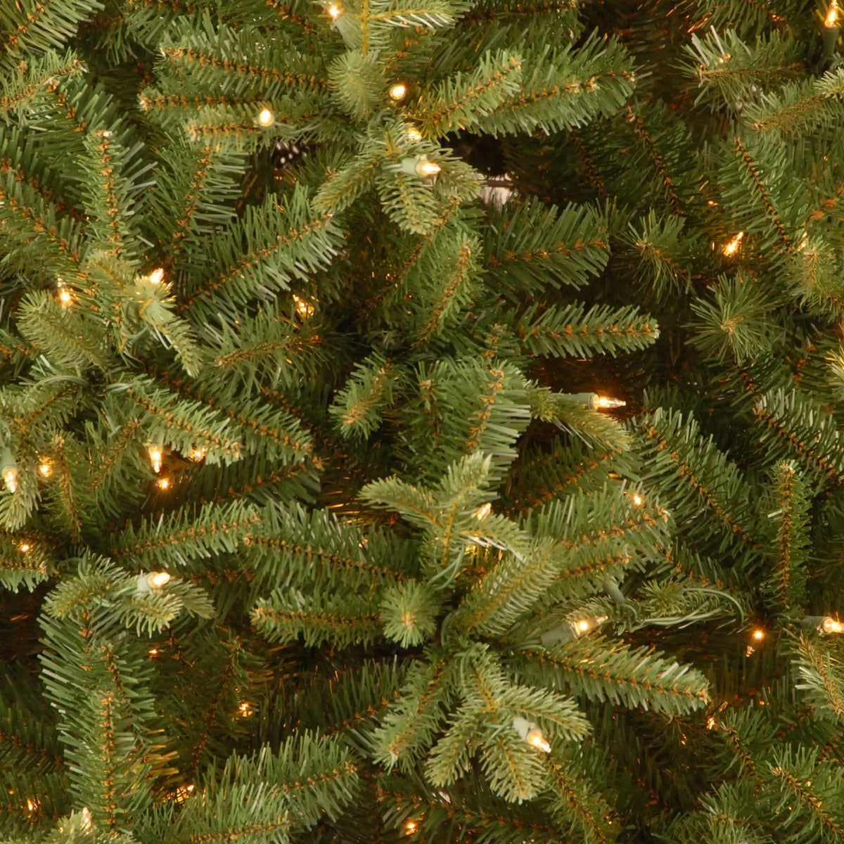 9 ft. Pre-Lit Tiffany Fir Slim Tree with Clear Lights - PE Branch Tips, Plug-In