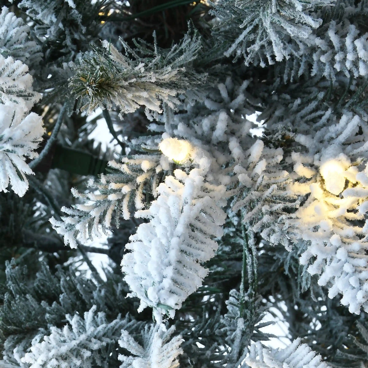 4.5 ft. Pre-Lit Snowy Alpine Fir Tree with LED Lights, Plug-In
